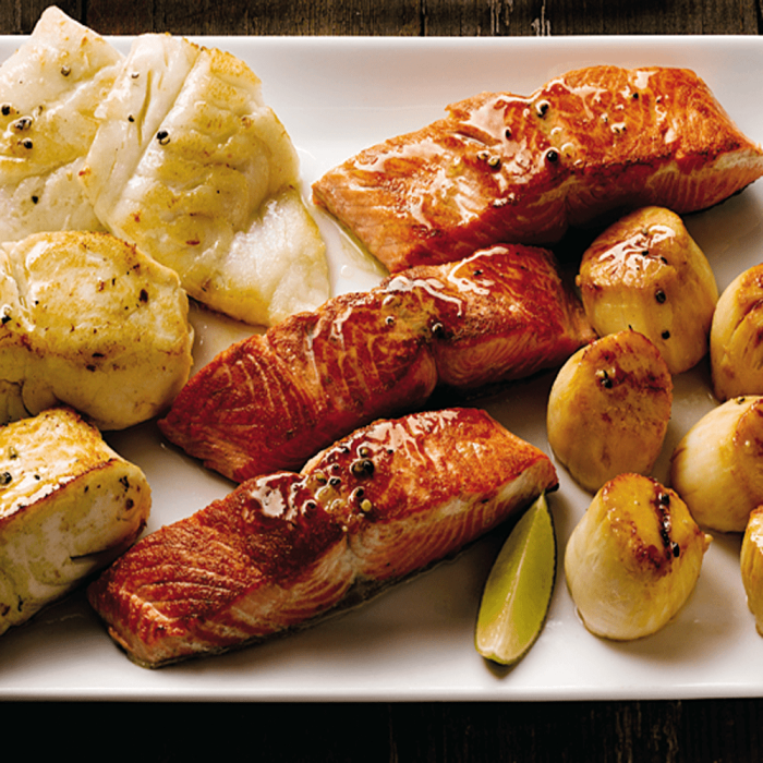 A variety pack of Alaskan Harvest Fish including different types of freshly caught fish, neatly packaged and ready for consumption.
