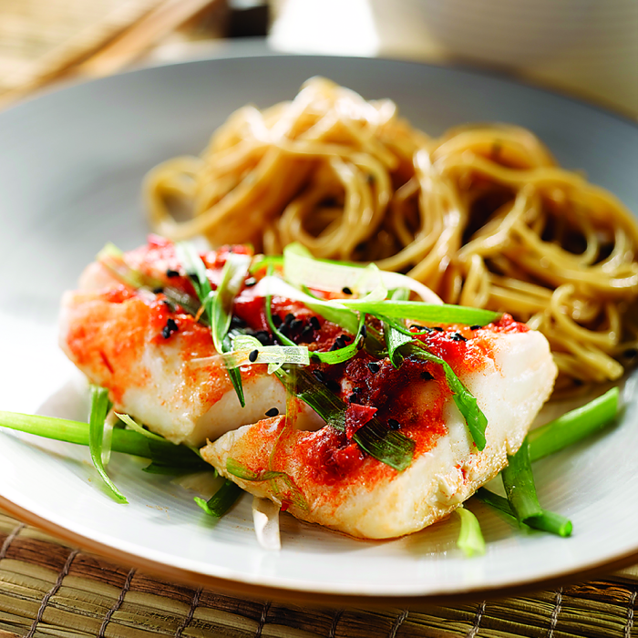 A large combo of Alaska whitefish  featuring cod whitefish served with side dishes.