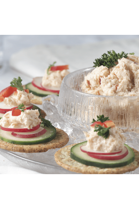 A container of smoked salmon spread.